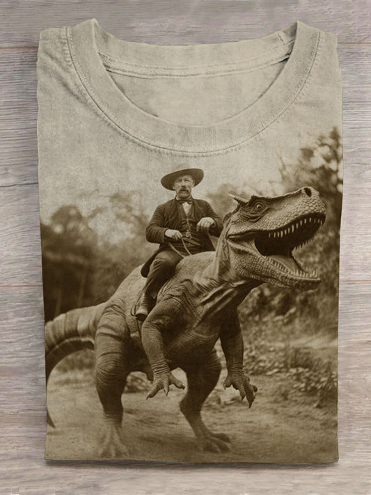 Old Cowboy Rides A Dinosaur Unisex Tee